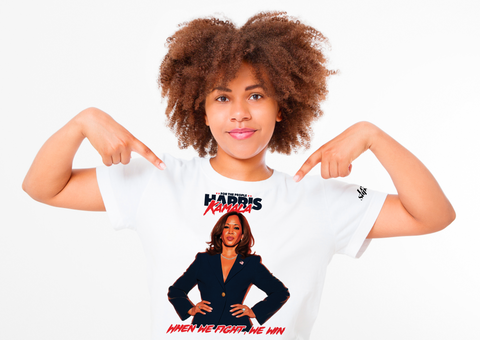 Heavyweight T-shirt in white showcasing Kamala Harris's memorable phrase "Say it to my face," paired with a stylized portrait of her and her signature beneath, creating a striking and empowering design.

